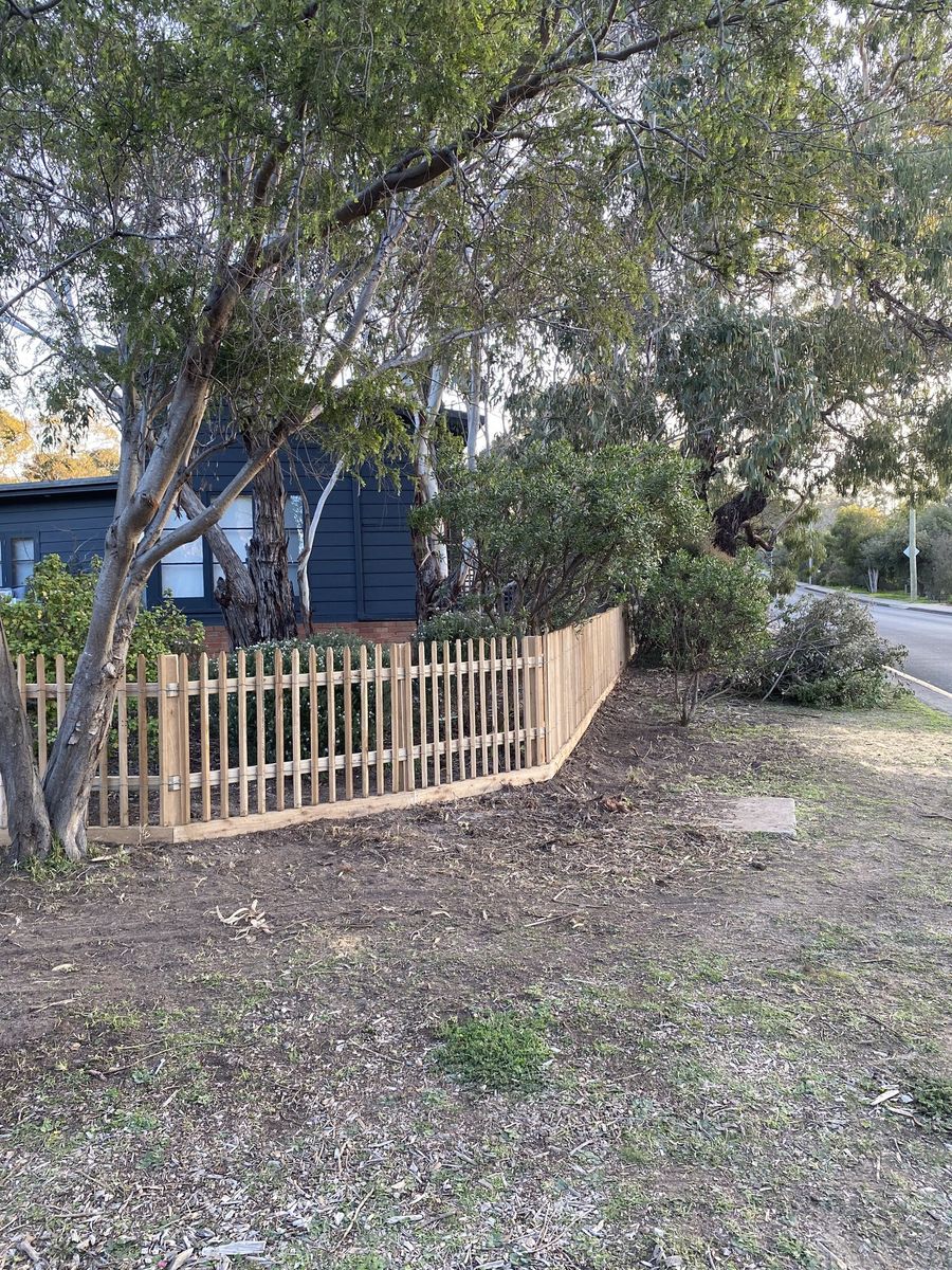 Wattle and wire with rails and cypress plinth