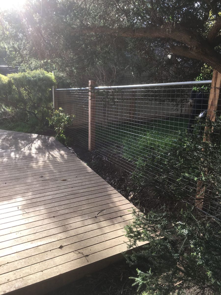 Mesh panel with galvanised pipe top rail